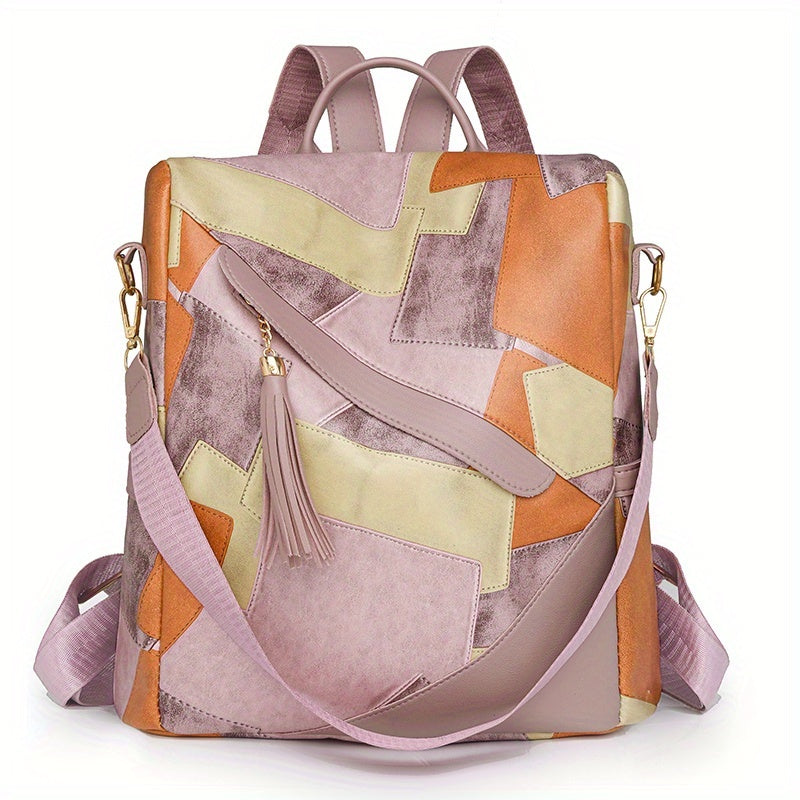 Pink patchwork backpack with orange and pale yellow panels, a tassel, gold clasps and a pink crossbody strap, shown from the front. 11