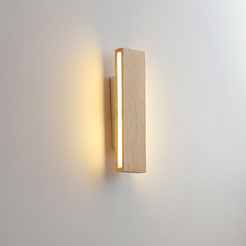 Beige and white Japanese-style LED wall light on a white wall, another view shown vertically and lit.
