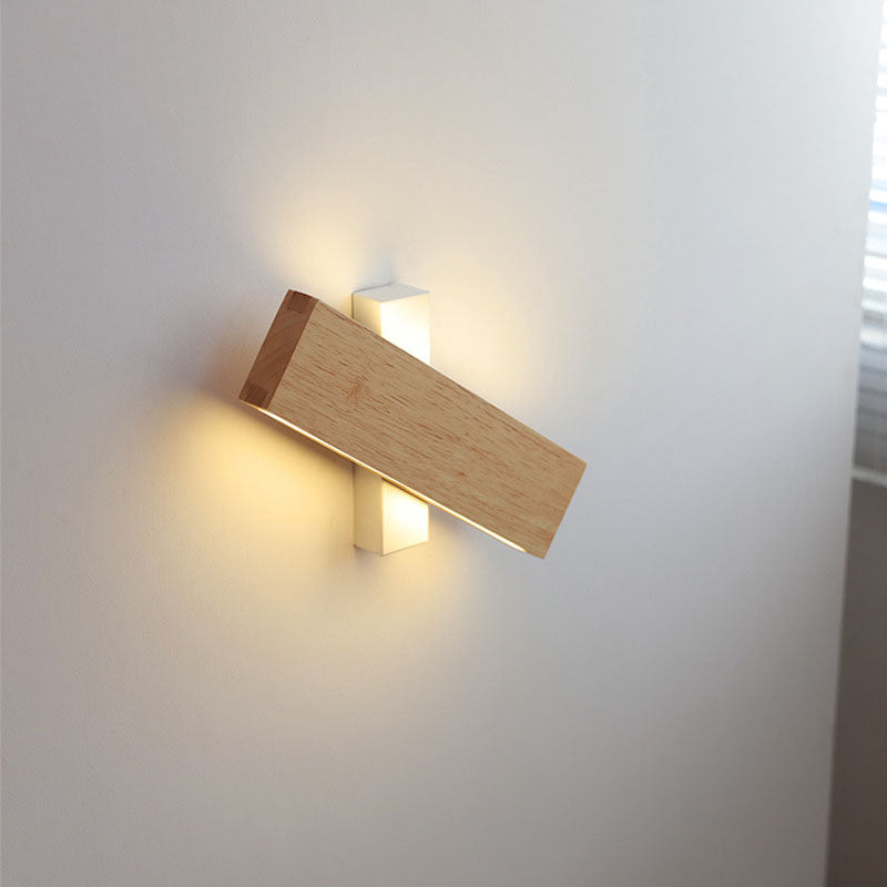 Beige and white Japanese-style LED wall light on a white mount, another view tilted and lit.