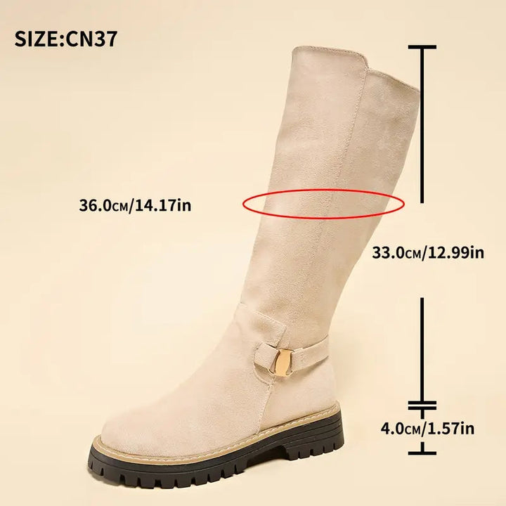 Beige tall boot detail with measurement lines marking shaft height, calf circumference and heel height.