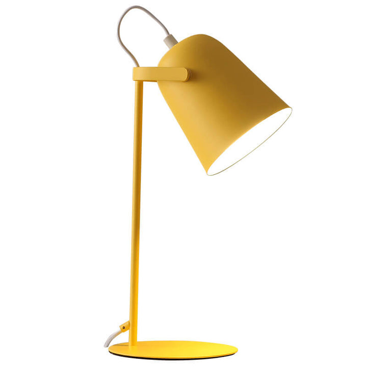 Yellow lamp on a plain white background, showing the tilted bucket shade, slim stem and round base 6