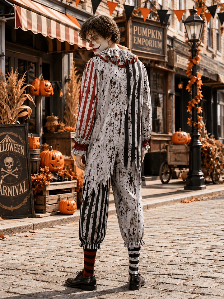 Back view of the clown jumpsuit worn by a model looking over his shoulder, showing jagged striped panels and the ruffled collar from behind. 3