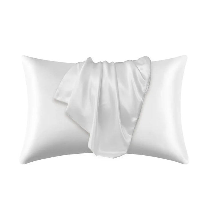 White pillowcase made of 100% mulberry silk on a plain white background.
