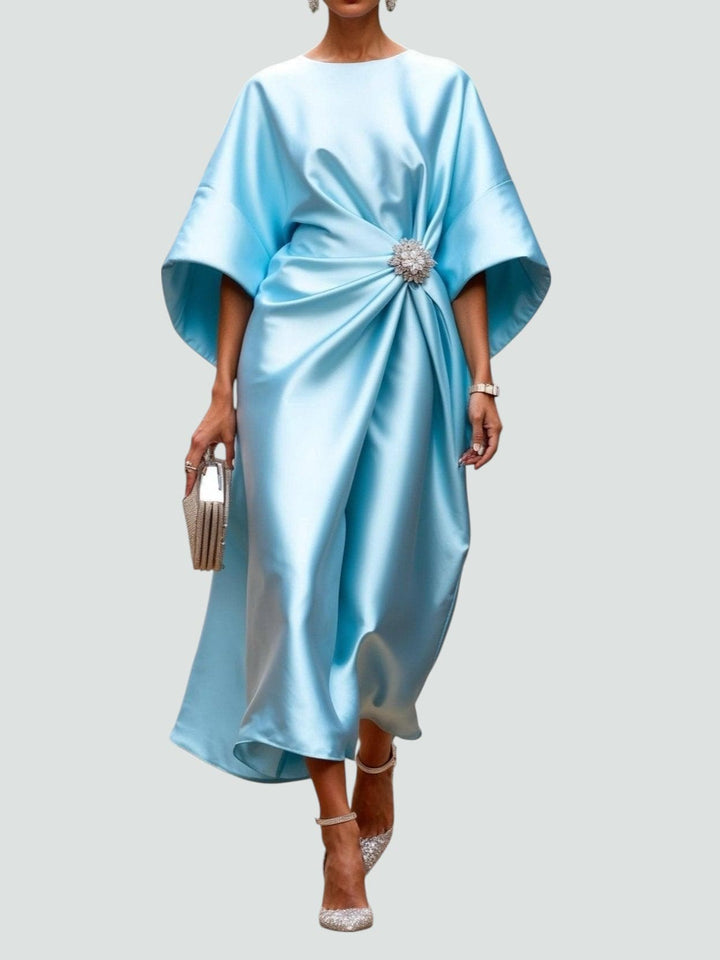 Women’s blue satin maxi dress, another view, with cape sleeves and a brooch at the waist