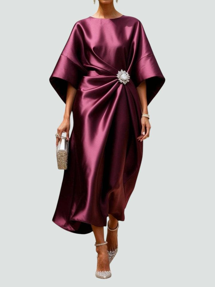 Women’s blue satin maxi dress, another view, with cape sleeves and a brooch at the waist