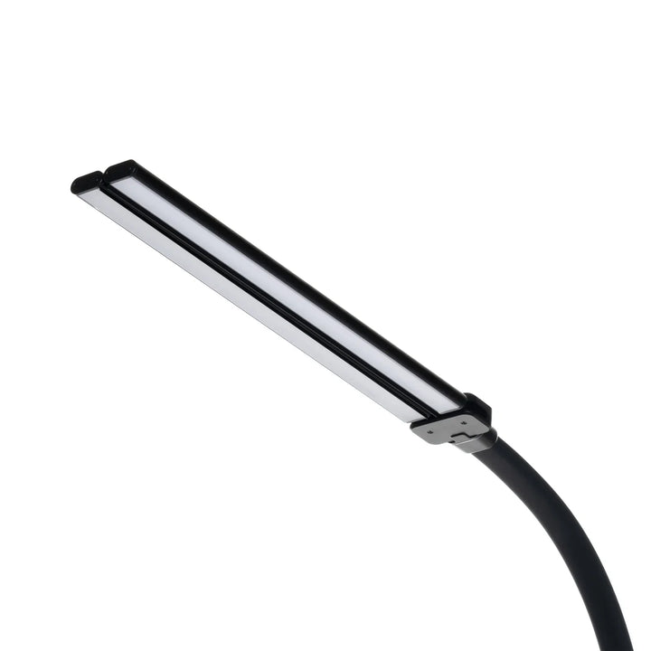 Black desk lamp detail showing the flat double-strip light bar on a curved neck.