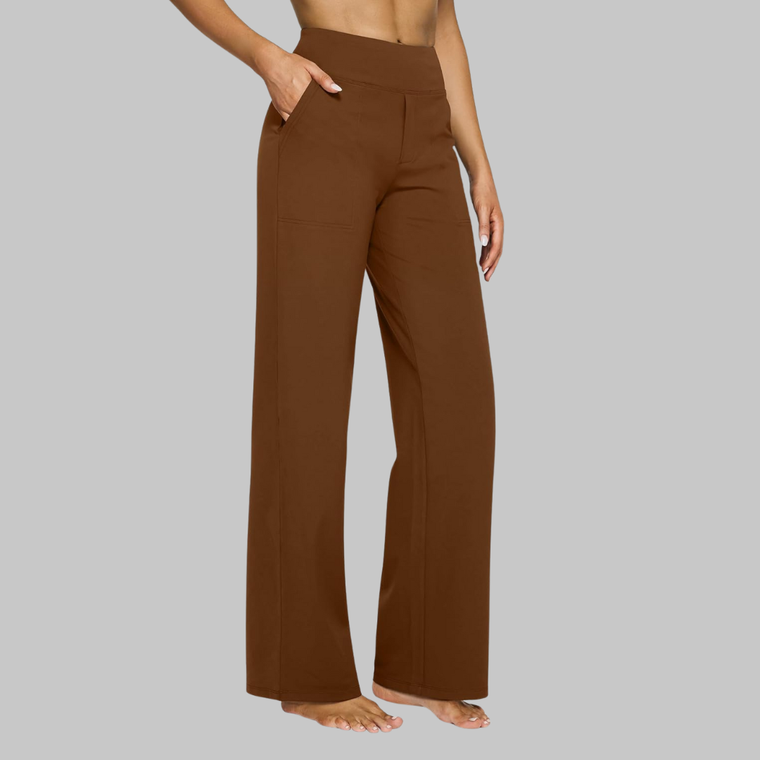 Women's rich rust-brown high-waist straight-leg pants on a model, three-quarter side view showing the patch pocket.