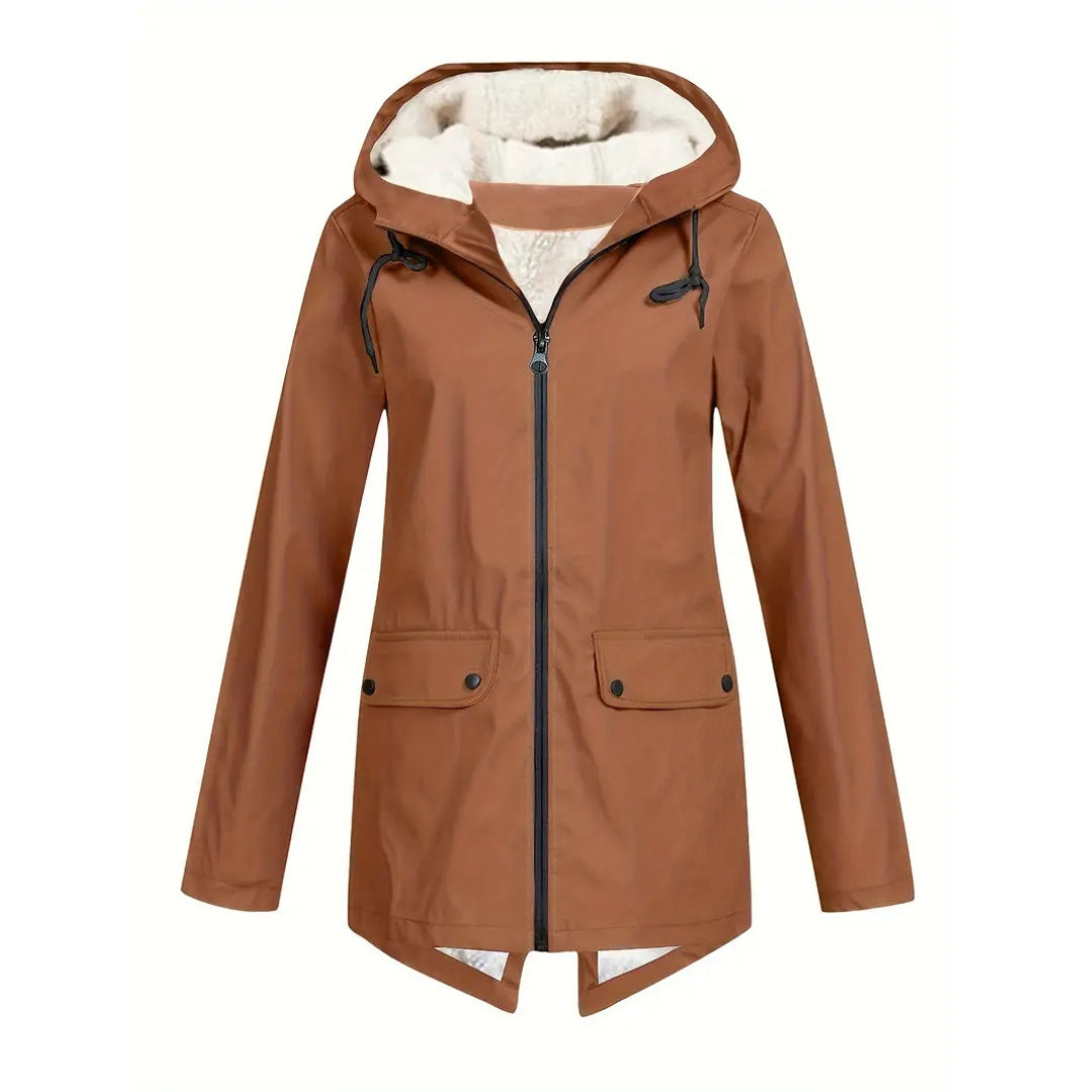 Flat lay detail of the rust-brown jacket zipped, showing the fleece-lined hood, drawstrings, snap flap pockets and curved hem.