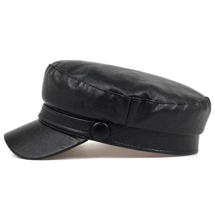 Side profile of the black faux leather cap showing the button, band and rounded crown 10