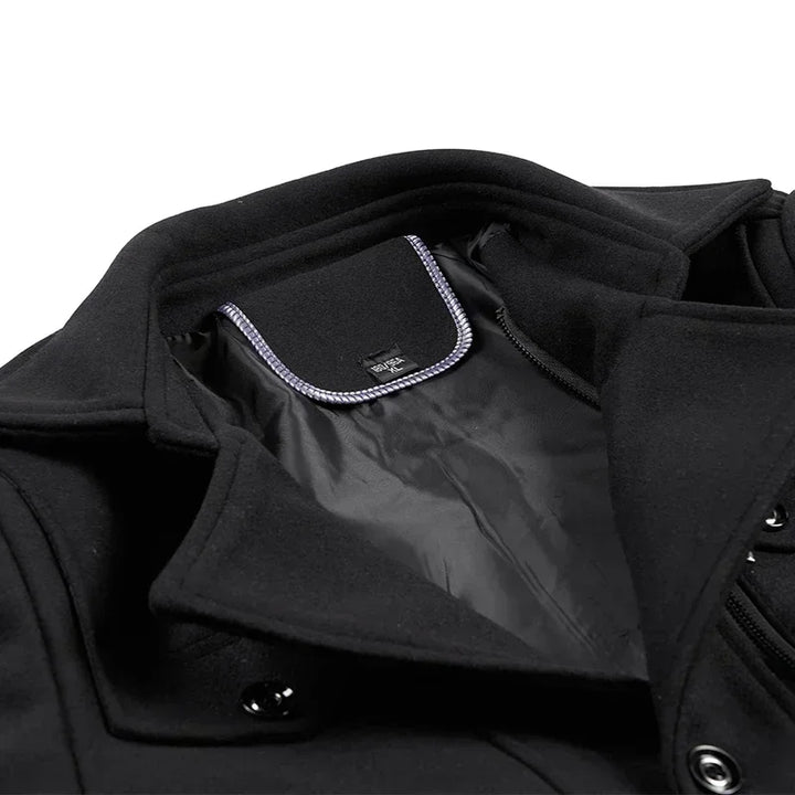 Close-up of the black coat collar and neck area, showing the inner lining and snap buttons 10