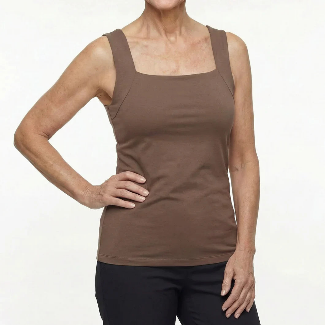 Model with a hand on her hip wears the square-neck tank in brown, shown from the neck to the hips. 3