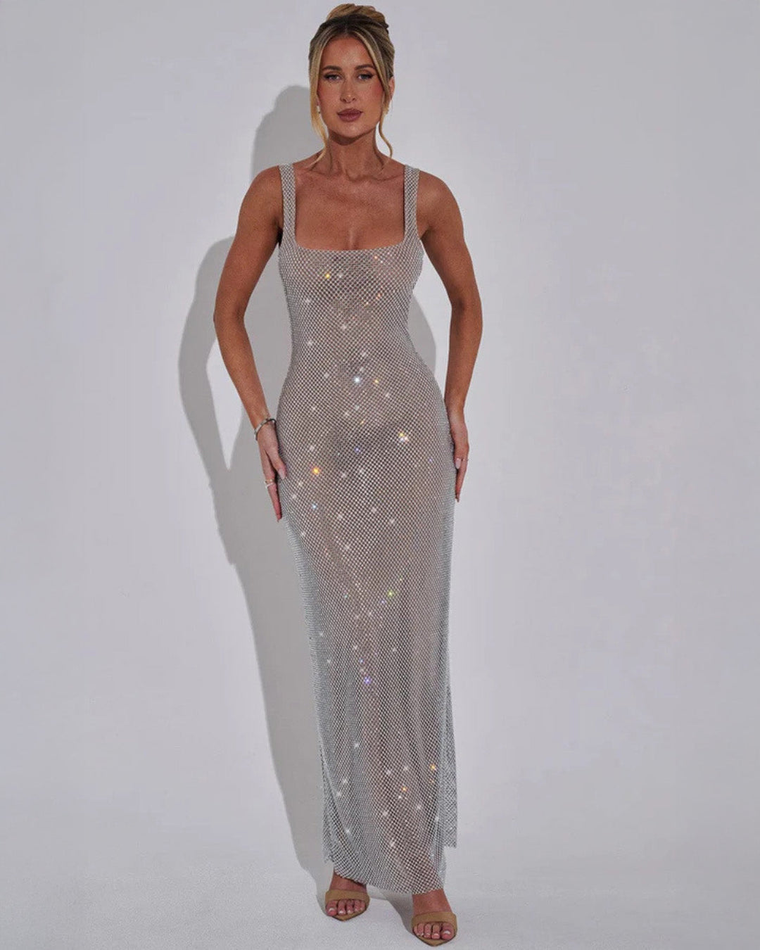 Front view of the silver-gray rhinestone mesh version on a model standing with hands at her sides, square neckline and wide straps visible. 6