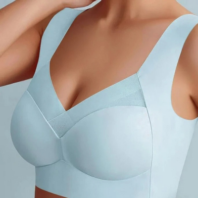 Model wearing a pale blue seamless bra with wide straps and a smooth V-neckline 18