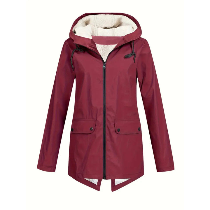 Flat lay detail of the burgundy red version of the jacket with fleece-lined hood, black zipper and snap flap pockets.