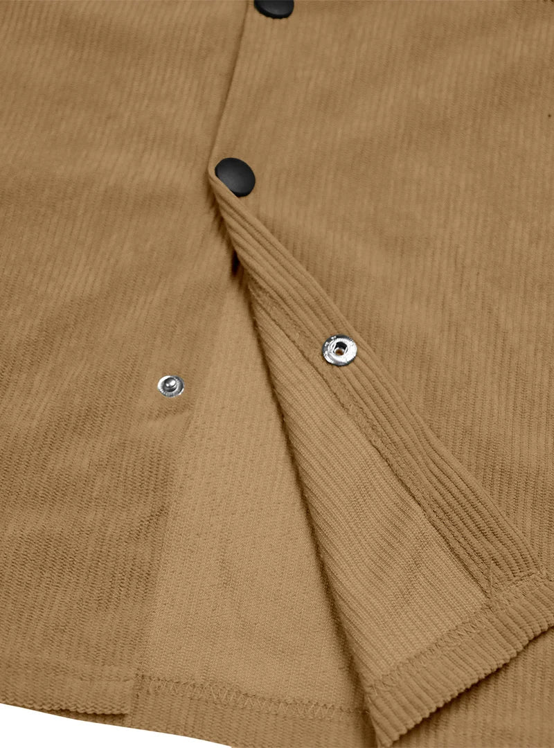 Inside of the tan shirt's front placket showing metal snap fasteners and black snap buttons 11