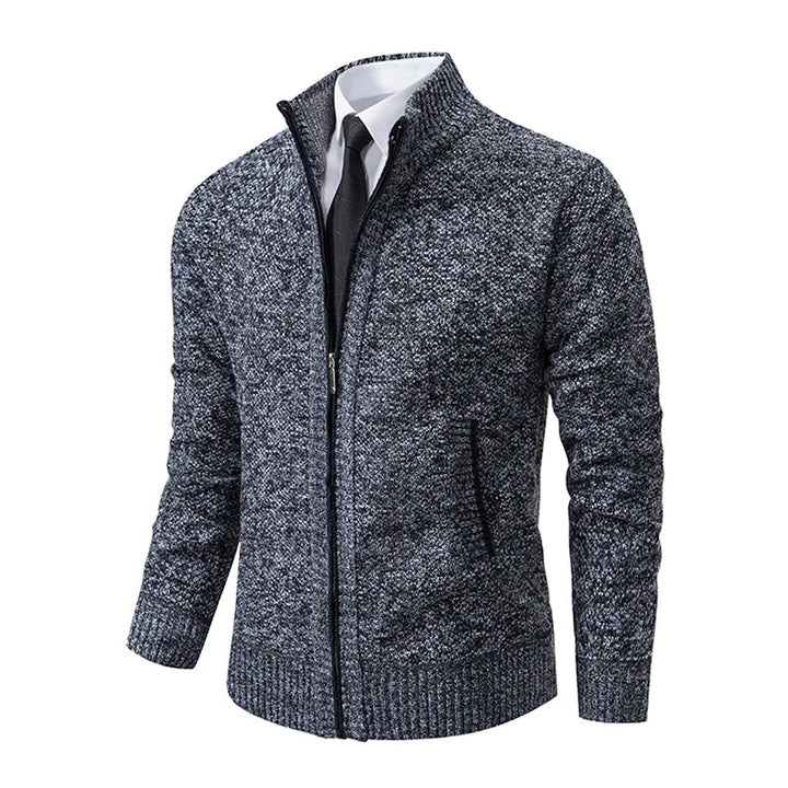 Dark gray marled knit zip cardigan at an angle, showing the pocket and ribbed cuffs 11