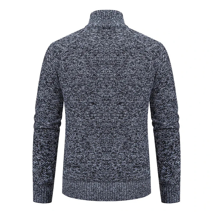 Back view of the dark gray marled cardigan showing the textured knit and ribbed hem 12