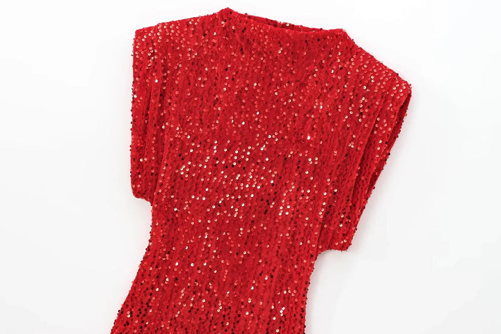 Upper part of red sequined dress laid flat, showing neckline and padded shoulder 12