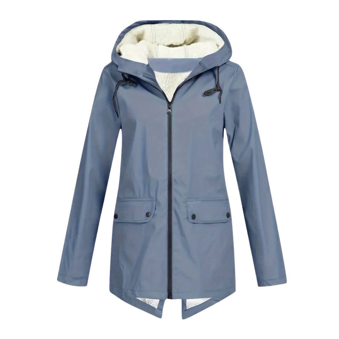 Flat lay detail of the slate blue version of the jacket with fleece-lined hood, drawstrings and two snap flap pockets.