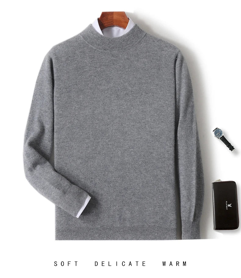 Medium gray knit sweater on a hanger over a white shirt, shown with a watch and wallet 12