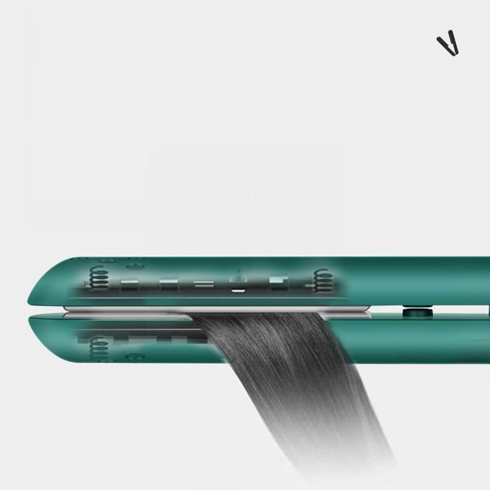 Cutaway view of the green straightener's inner springs and plates clamping a strand of straight dark hair 3
