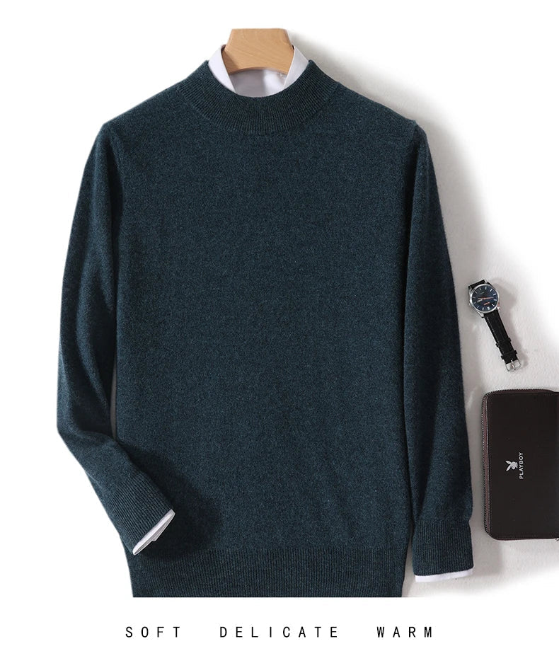 Dark teal green knit sweater on a hanger over a white shirt, with a watch and wallet 13