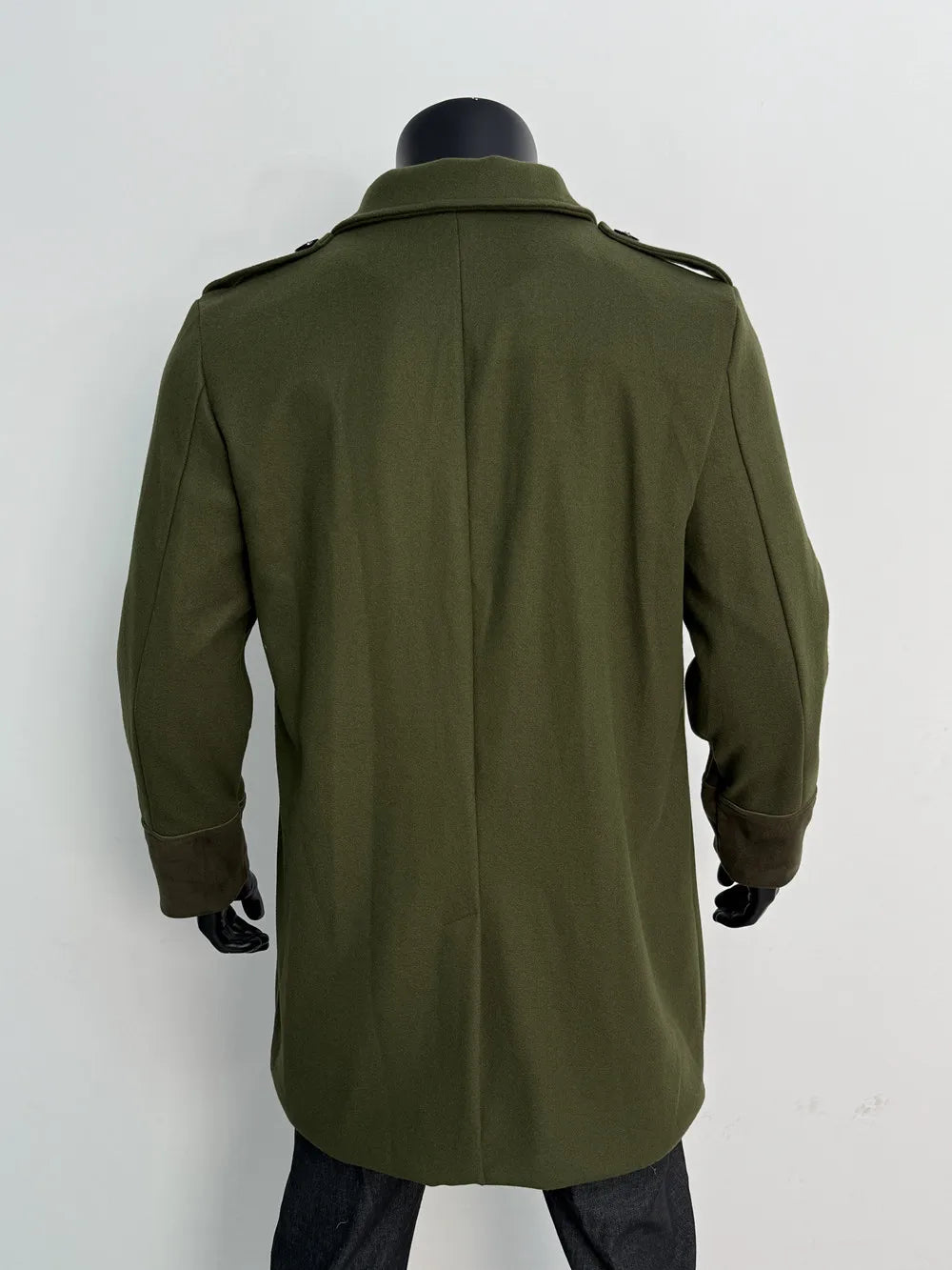 Back view of the olive green coat on a mannequin, showing the center seam, epaulettes and darker cuffs 13