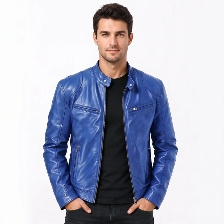 Model in a vivid blue leather biker jacket over a black tee, hands in pockets 14