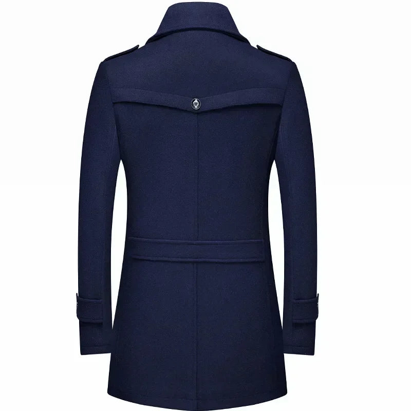 Back view of the navy coat, showing the button yoke flap, waist strap and sleeve tabs 15