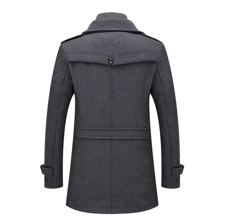Back view of the gray overcoat, showing the back yoke with button and belted waist detail 15