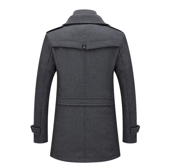 Back view of the gray overcoat, showing the back yoke with button and belted waist detail 15