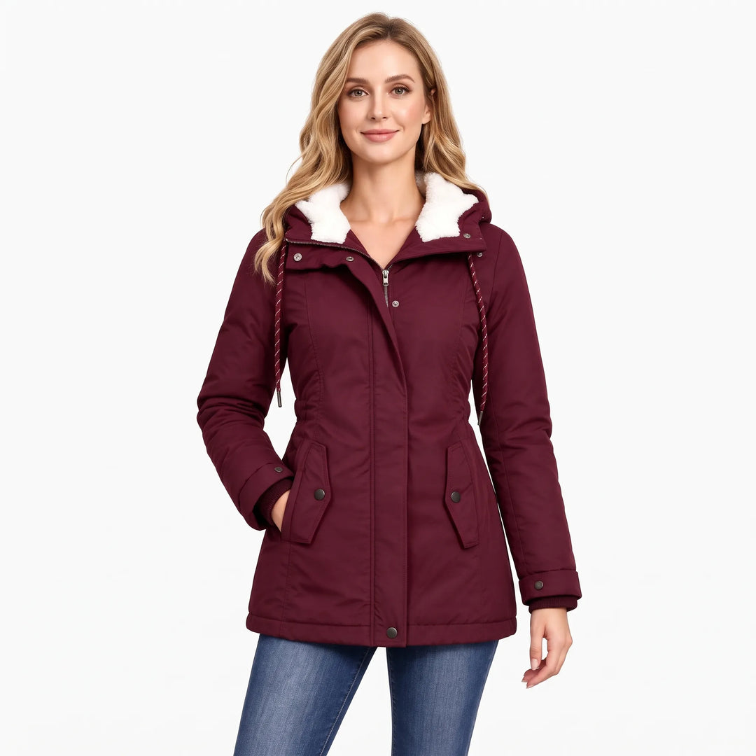 Model wears the burgundy jacket with a white fleece hood lining, burgundy drawcords and jeans 15