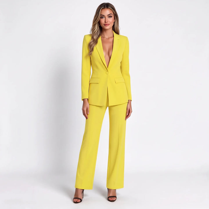 Full-length studio view of the bright yellow suit with deep V blazer and wide-leg pants 15