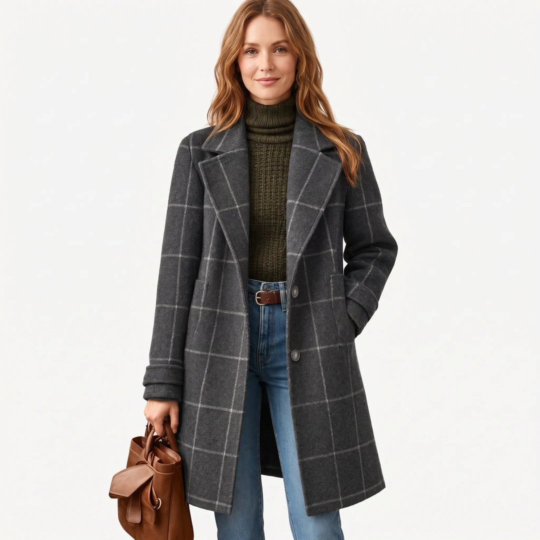 Model wearing the charcoal gray checked coat with a hand in pocket, studio shot on white 15