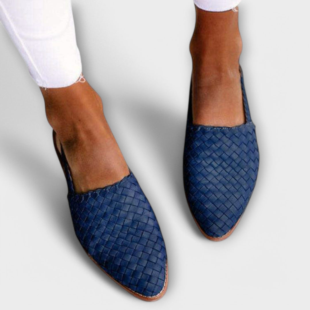 Navy blue woven pointed-toe flats, another view.
