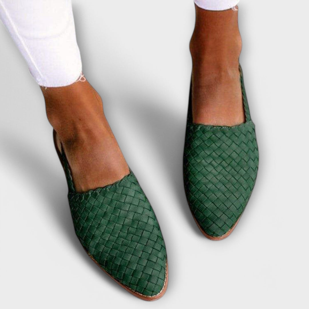 Dark green woven pointed-toe flats, another view.
