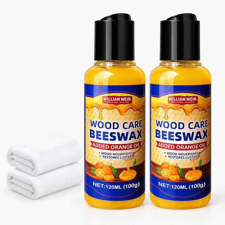 Two polish bottles side by side with two stacked folded white towels in front 16