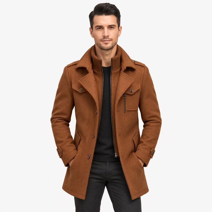 Model wears the camel brown coat open over a black sweater and dark pants 17