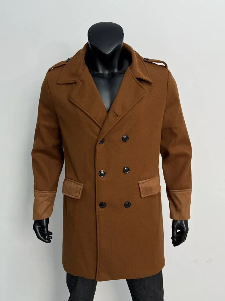 Caramel brown double-breasted coat on a mannequin, front view with black buttons and suede-look flaps and cuffs 17