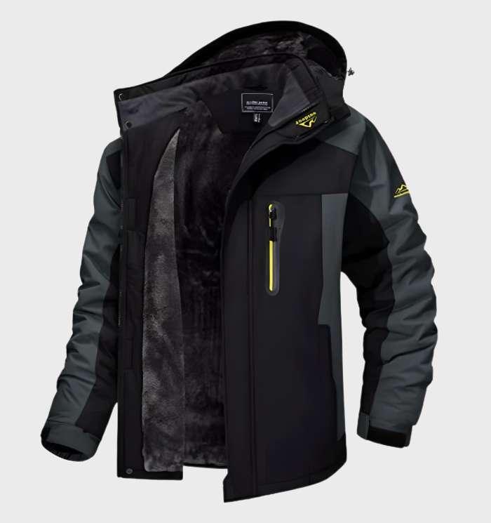 Black and gray hooded jacket, unzipped to show dark fleece lining and yellow-trimmed chest zip pocket 5