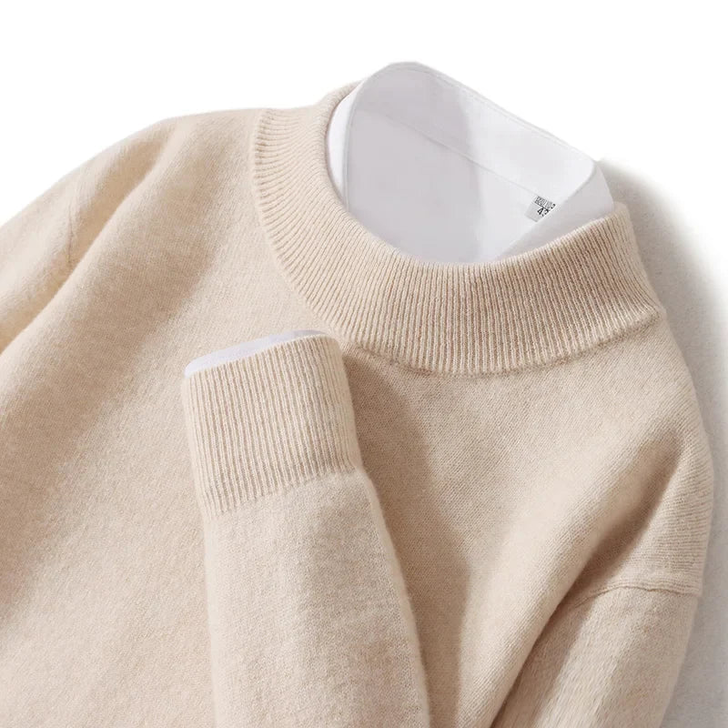 Close-up of a beige ribbed mock neck collar and cuff with a white shirt collar beneath 17
