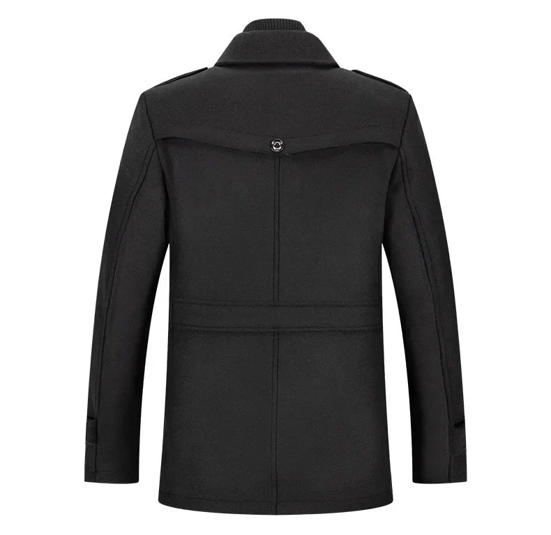 Back view of the black overcoat, showing the buttoned yoke, waist strap and shoulder epaulets 17