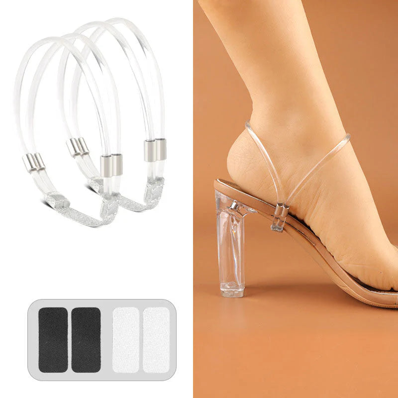 Pair of transparent clear shoe straps with metal clasps and adhesive pads on a clear-heeled sandal.
