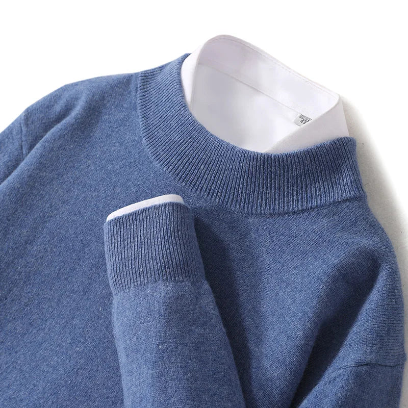 Close-up of a denim blue ribbed mock neck collar and cuff over a white shirt 19