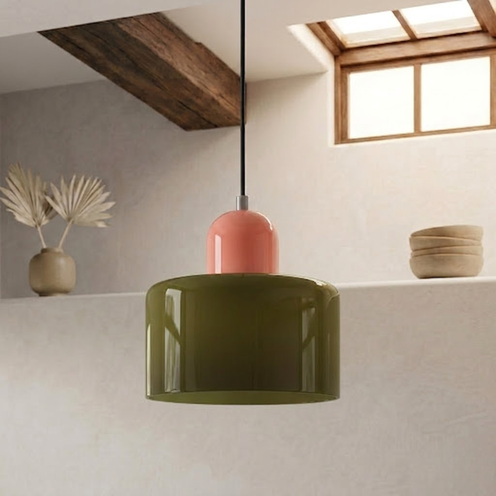 Olive green glossy drum shade with a coral-pink rounded cap, suspended from a black cord beneath a wooden beam. 7