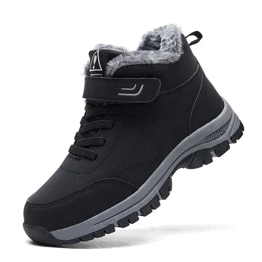 Black high-top winter boot with fleece lining, strap closure, laces and a gray lugged sole, side view 1