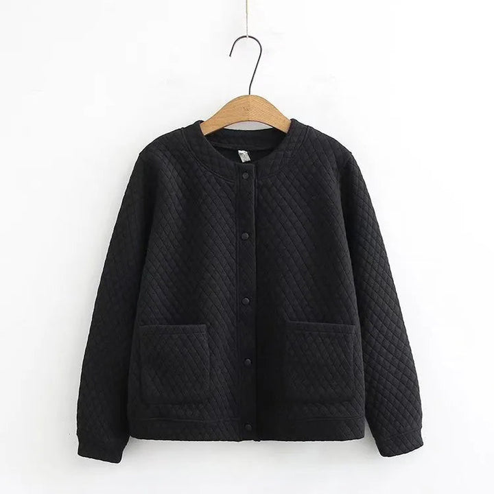 Schwarze gesteppte Jacke aus Baumwolle, Knopfleiste, zwei Taschen, Damenmode, elegant.