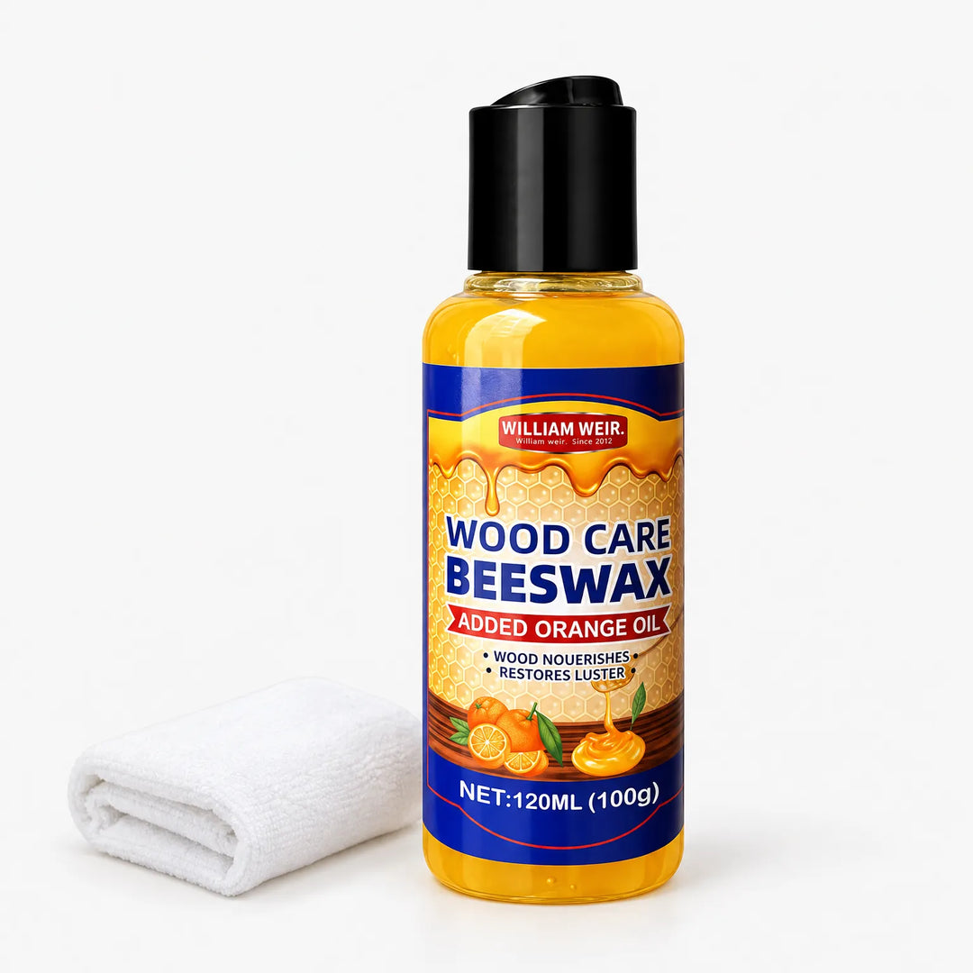 Amber liquid wood polish bottle with black flip cap beside a folded white cloth 1