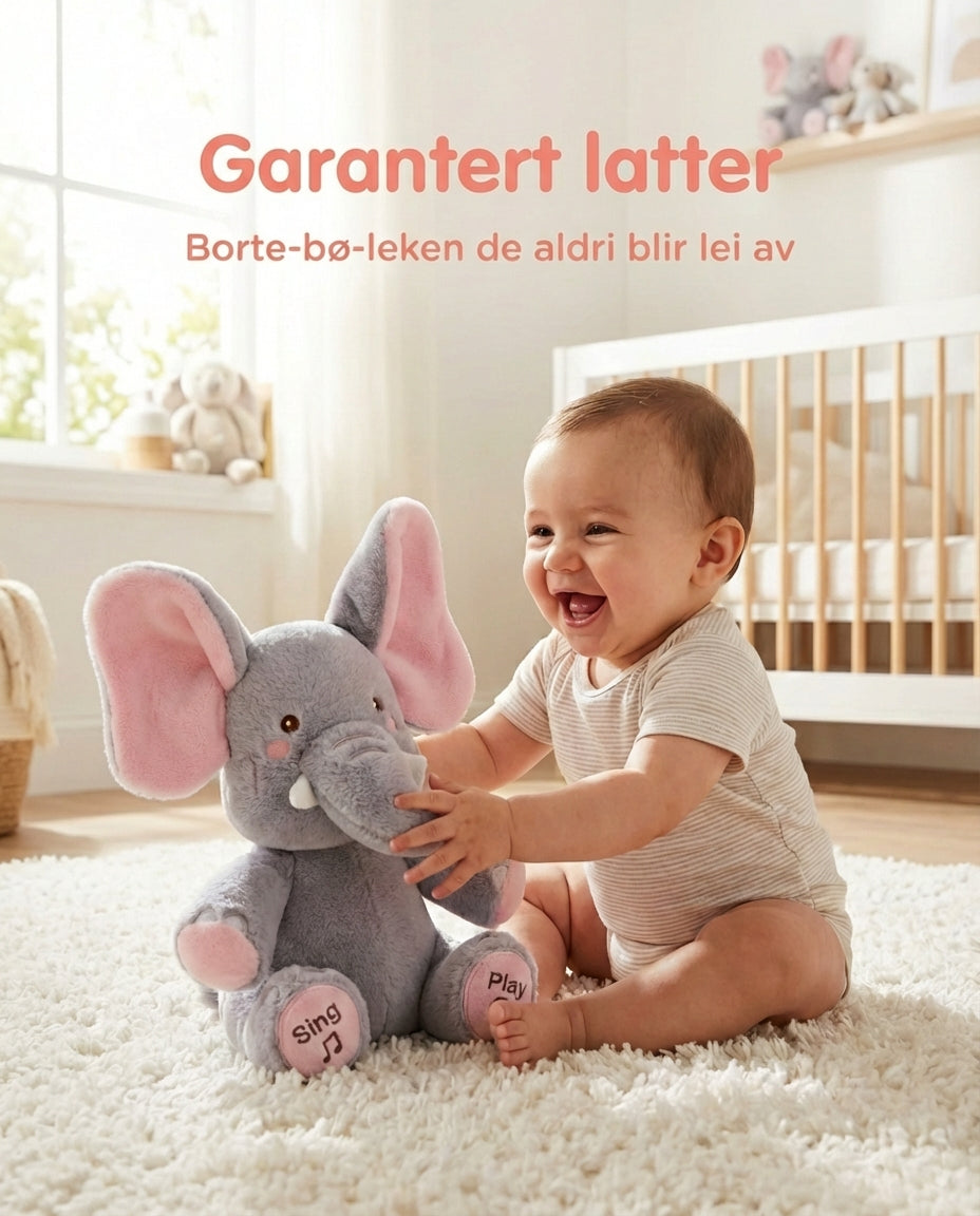 Another view of PeekaBuddy The Giggle Elephant Interactive Peekaboo Plush with a baby touching the trunk.
