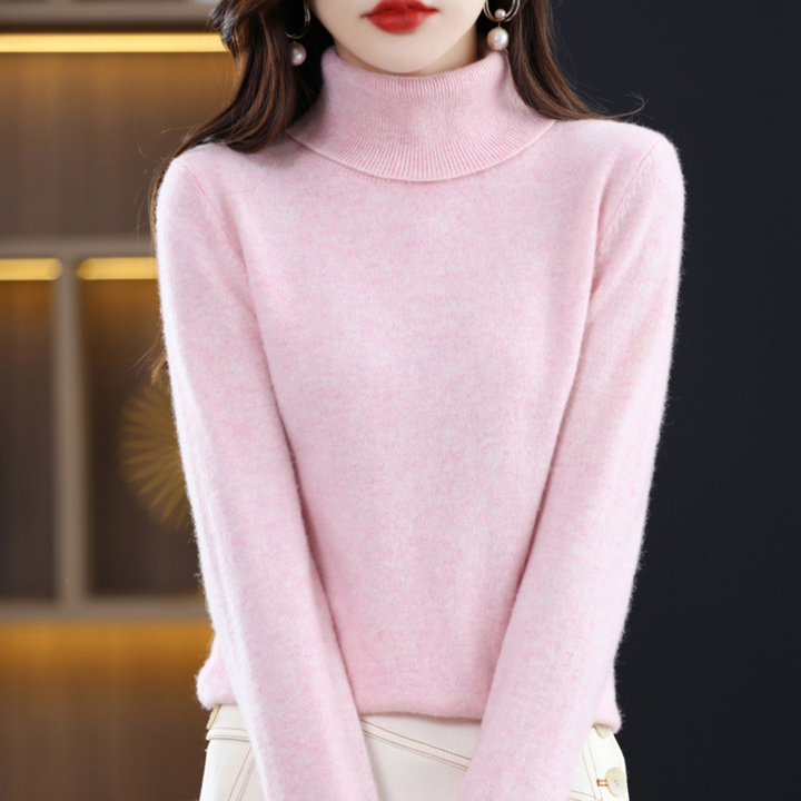 Pale pink heathered turtleneck sweater another view.